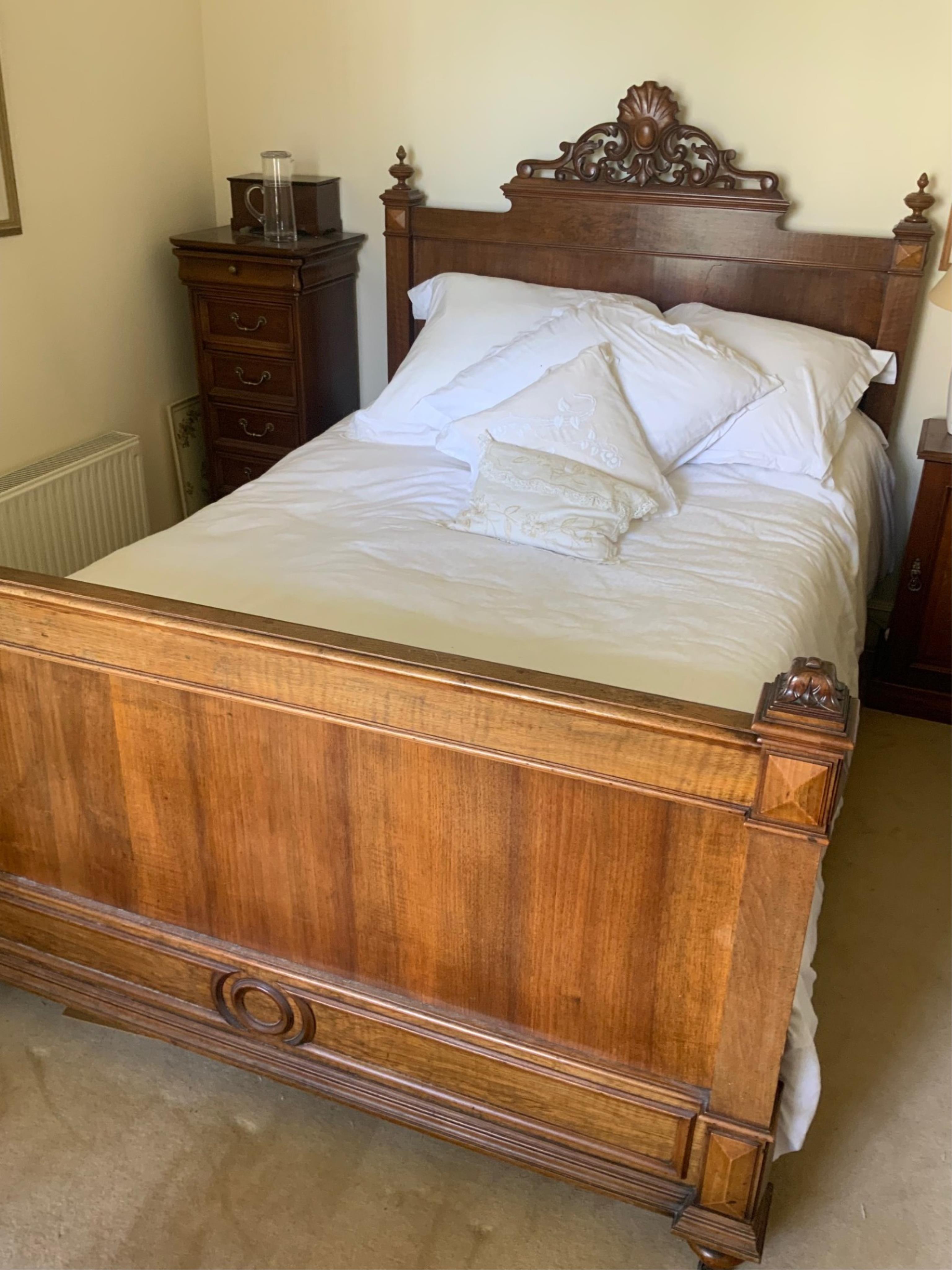 A late 19th century French walnut head and foot double bedstead, width 151cm, length 216cm. Condition - good
